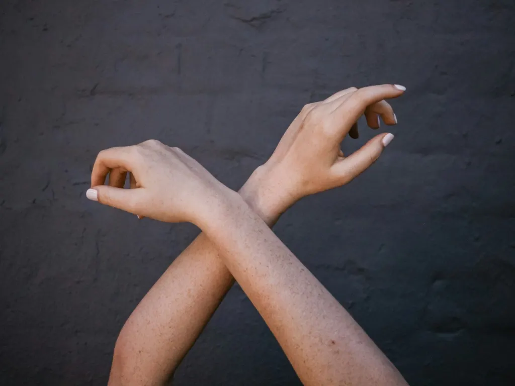 A woman's crossed arms